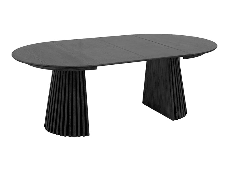 Runt svart matbord med iläggsskivor
